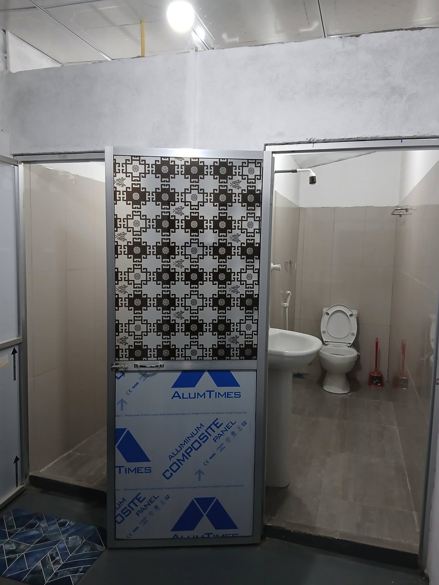 Clean common bathroom shower area and fixtures